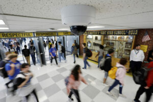 Hallway camera in a school providing a safe and secure learning environment, How to optimize school safety for COVID-19