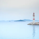 Lighthouse on a lonely dirt road preventing the threat of shipwrecks