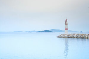 Lighthouse on a lonely dirt road preventing the threat of shipwrecks