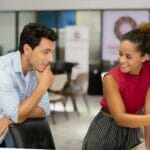 Two young professionals working on Organizational Resilience