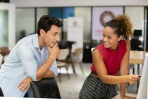 Two young professionals working on Organizational Resilience