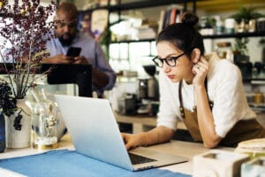 Small business workers discussing digital security - Small business assets protection